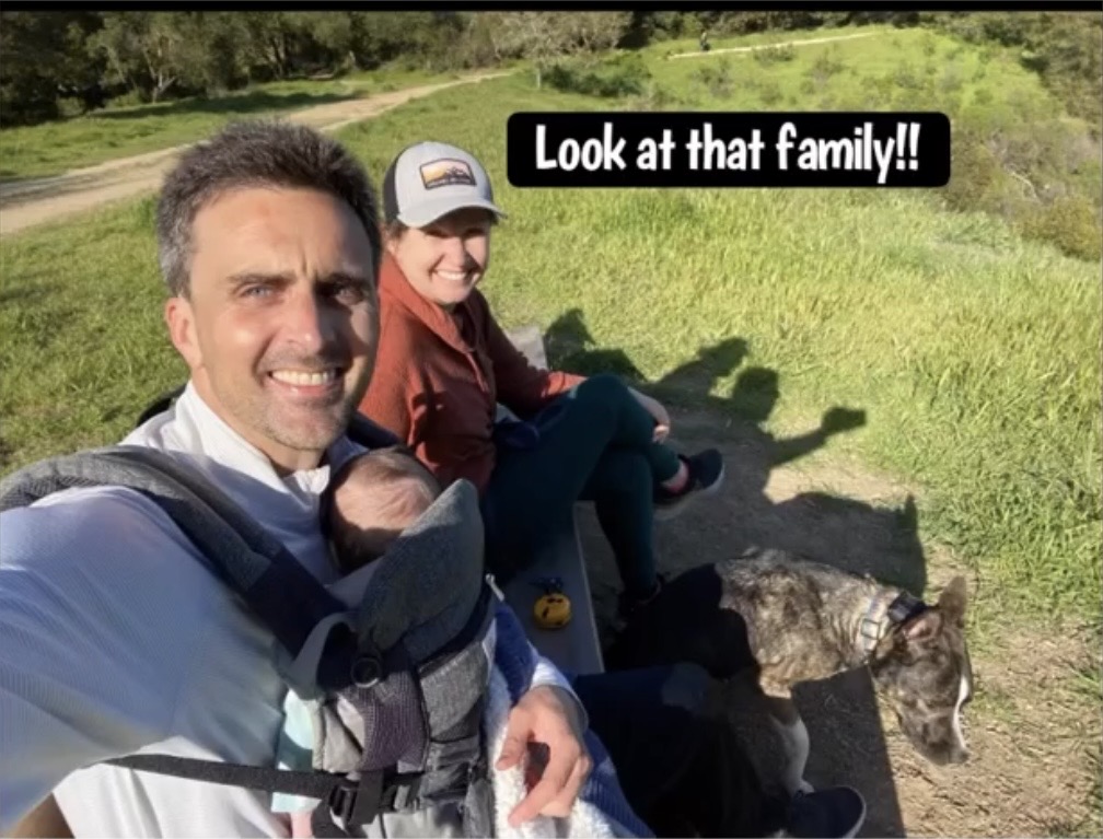 Henry relaxing with his family during a trail outing
